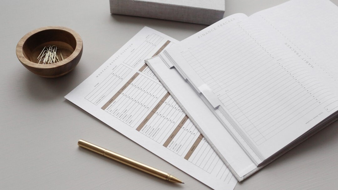 Notebook with a guide checklist on a desk