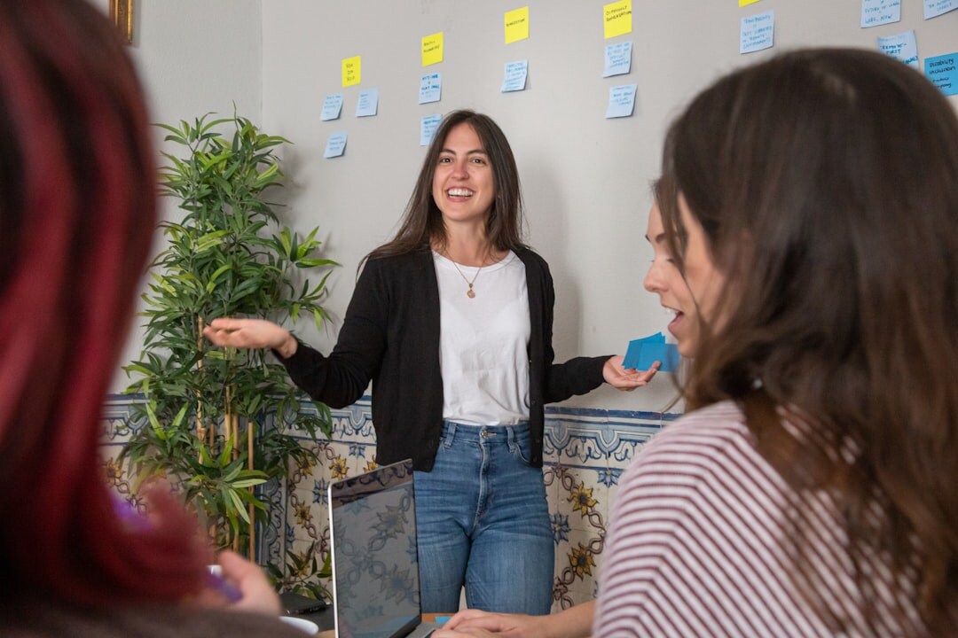 Woman speaking confidently during a group communication workshop