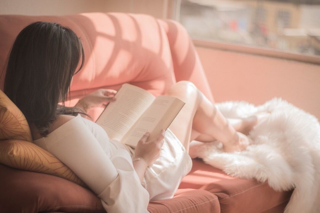 person reading book quietly