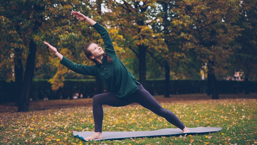 person doing yoga outdoors