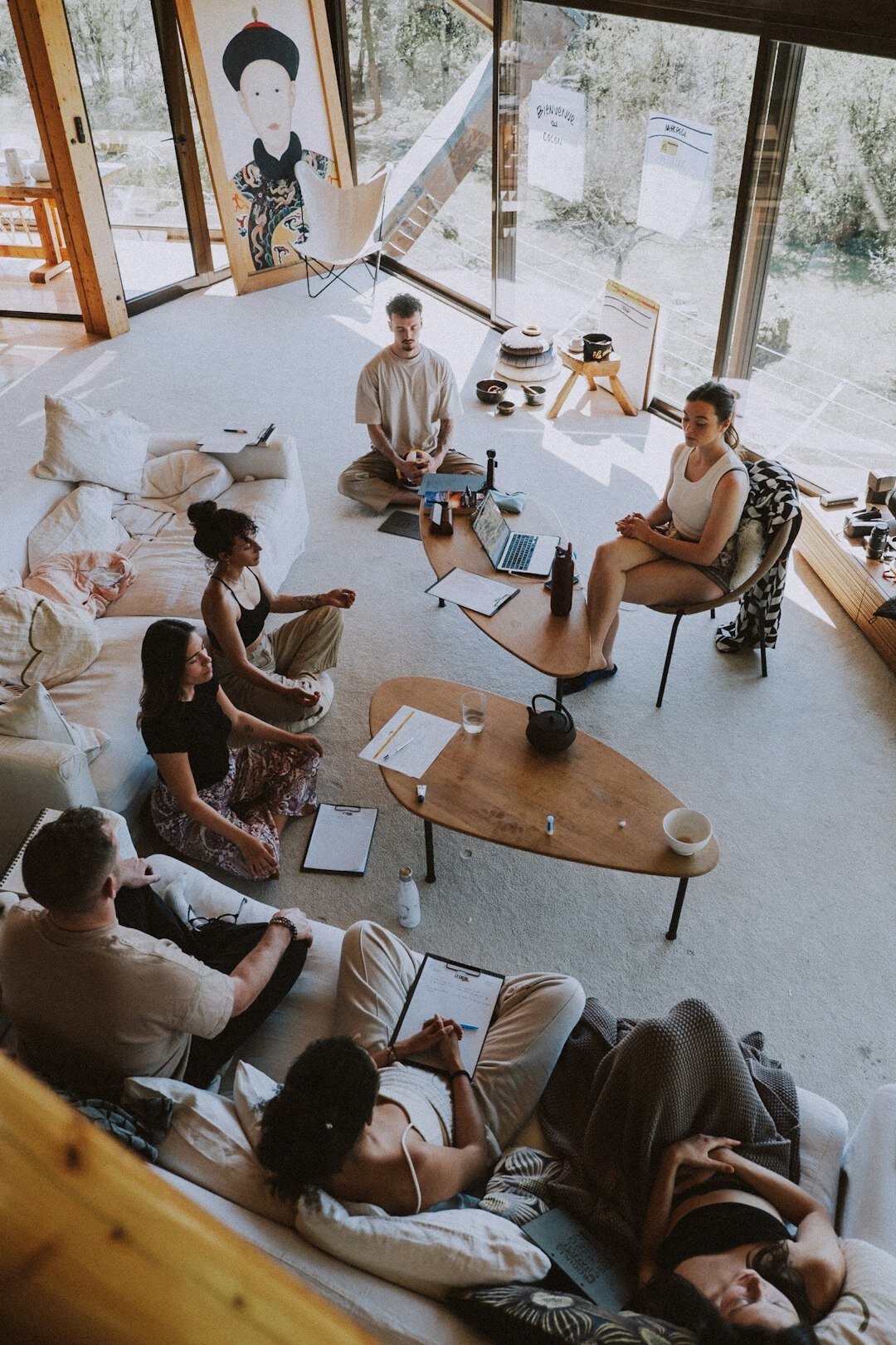 Small group sitting in a circle in an active listening session