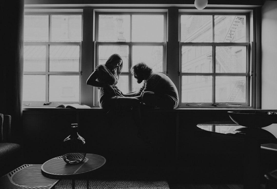 couple talking on couch