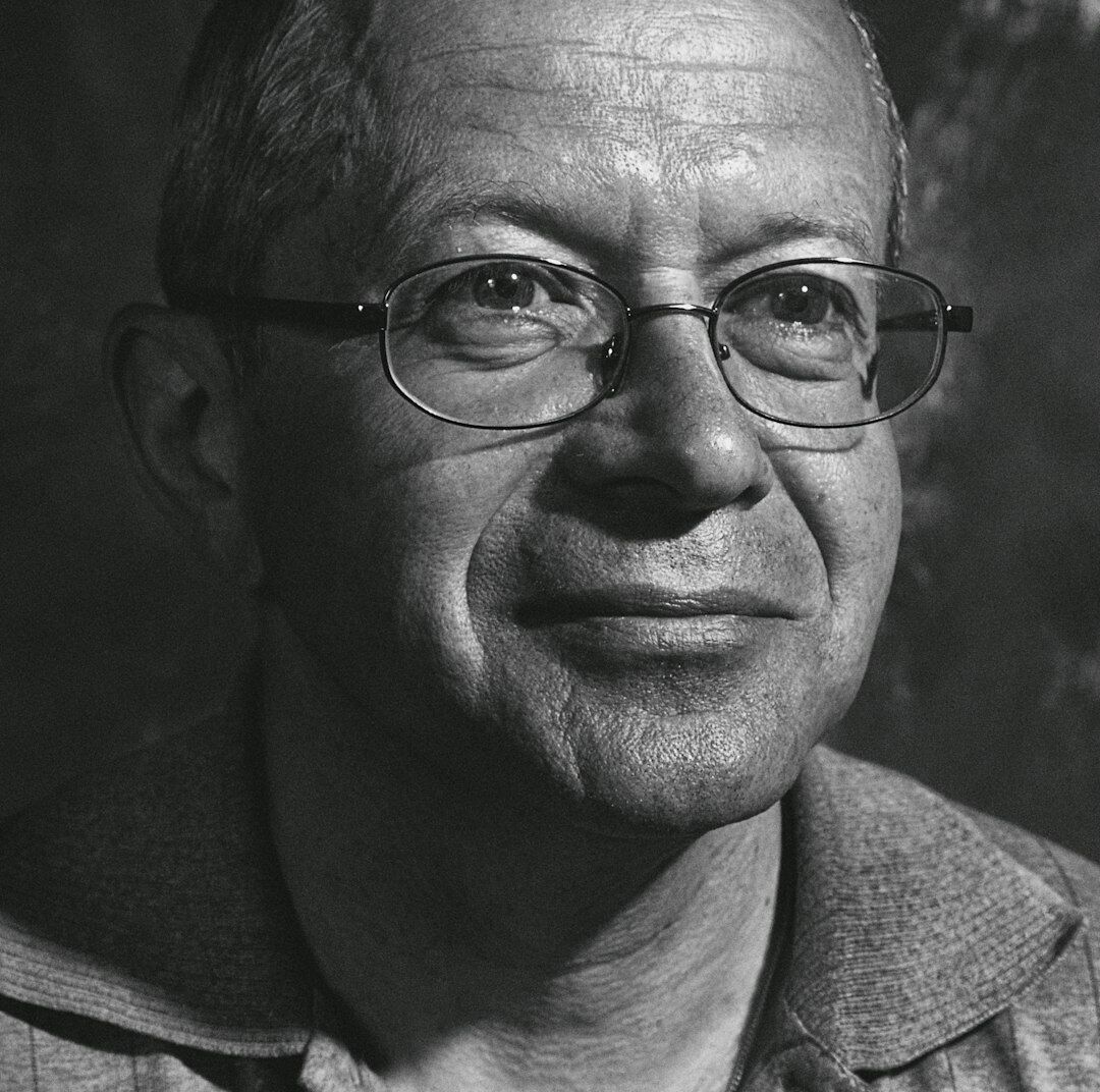 Portrait of a smiling brazilian man with glasses
