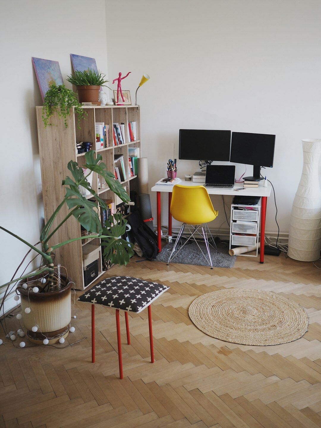 Bright home office corner with plants and warm light