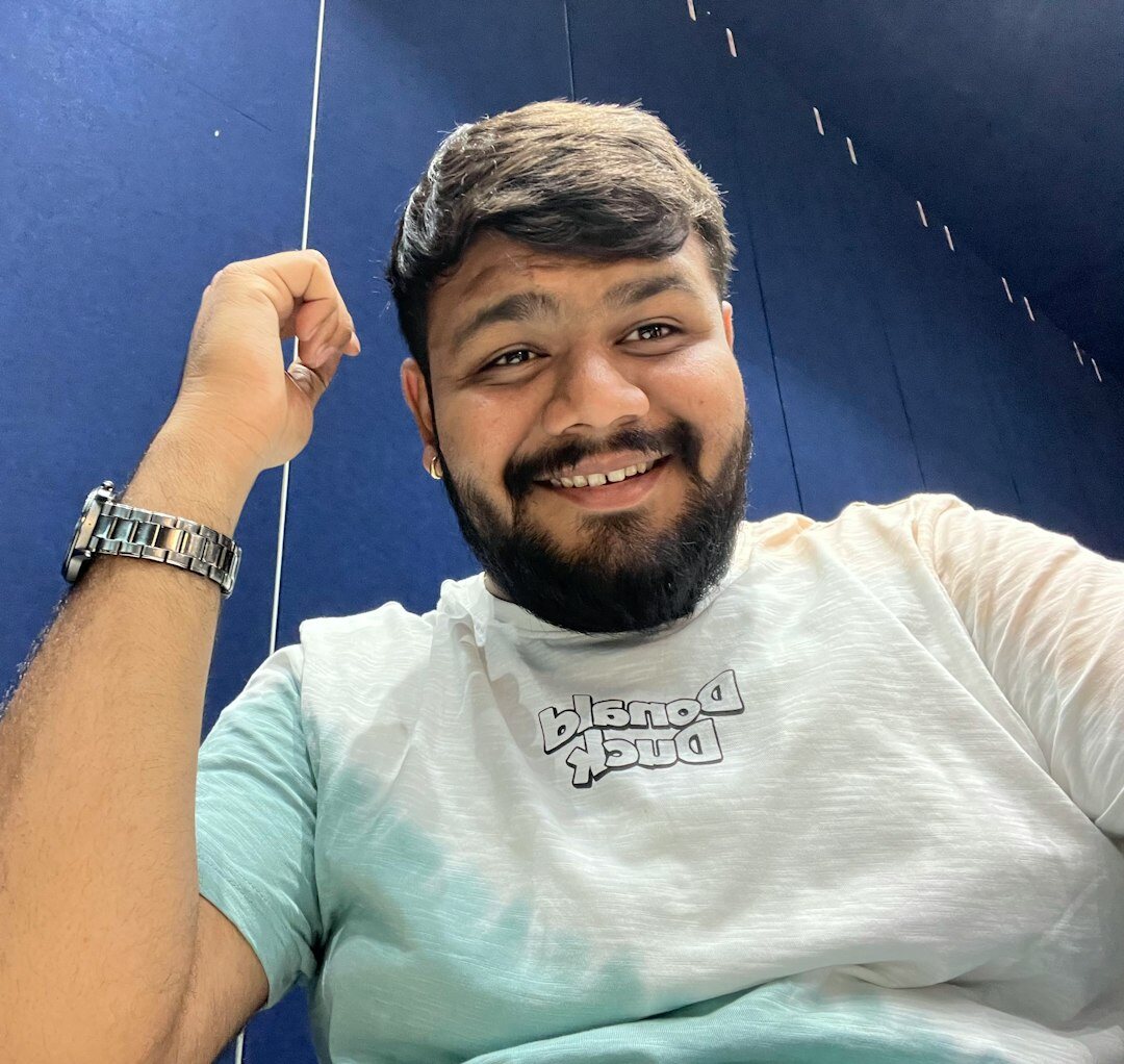 Portrait of a smiling brazilian man with short beard